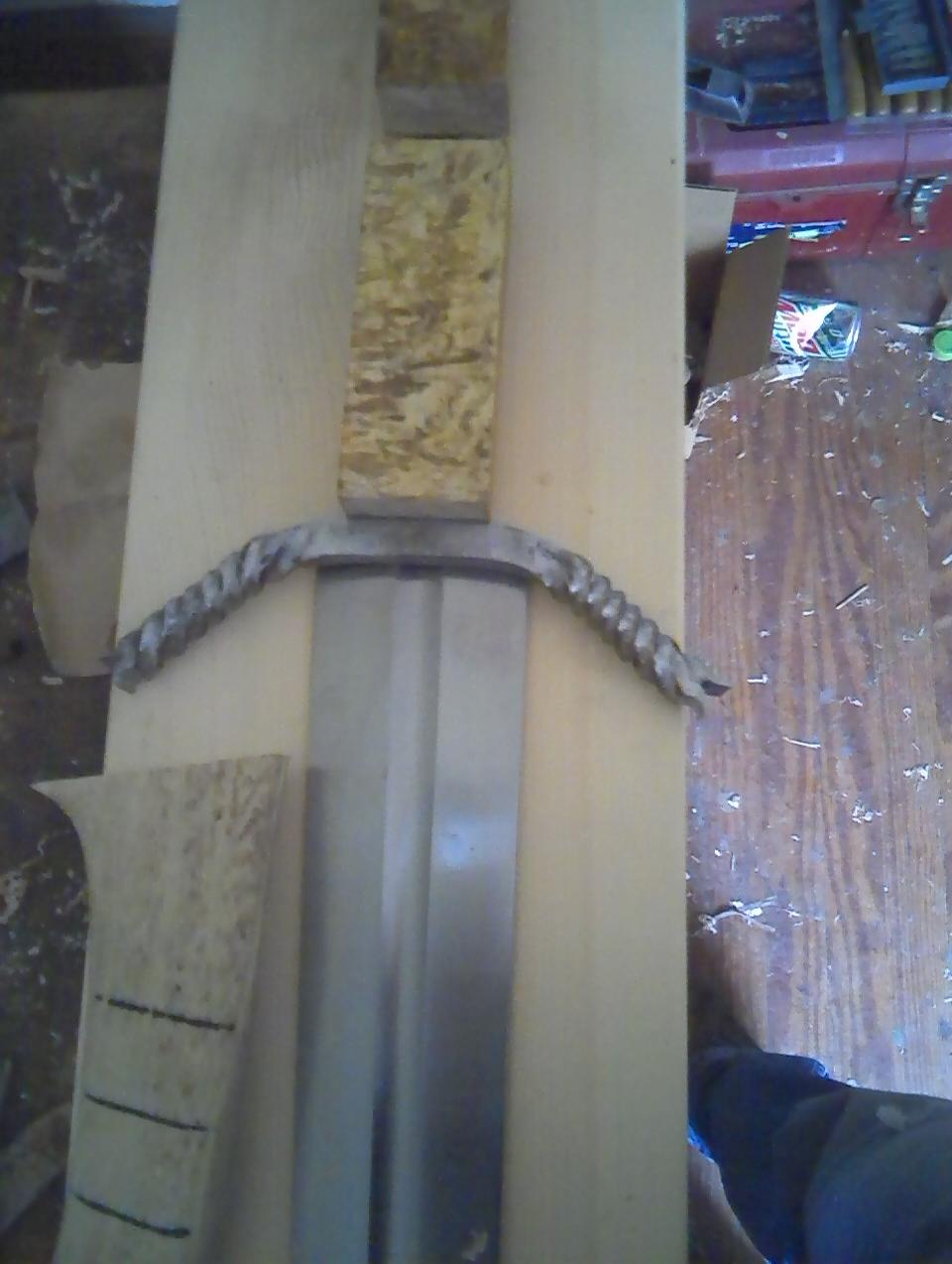Blade  and  materials  laid  out  on  the  bench