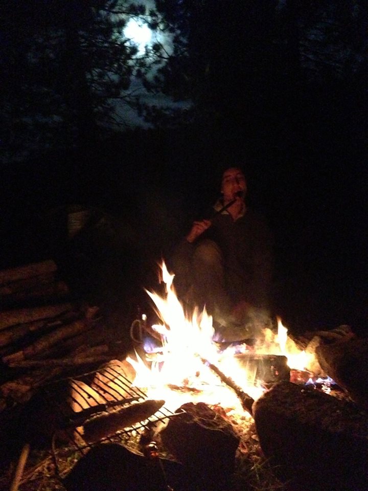 Yes, that would be the glorious moon overlooking Matthew as he eats a slab of meat off his knife.